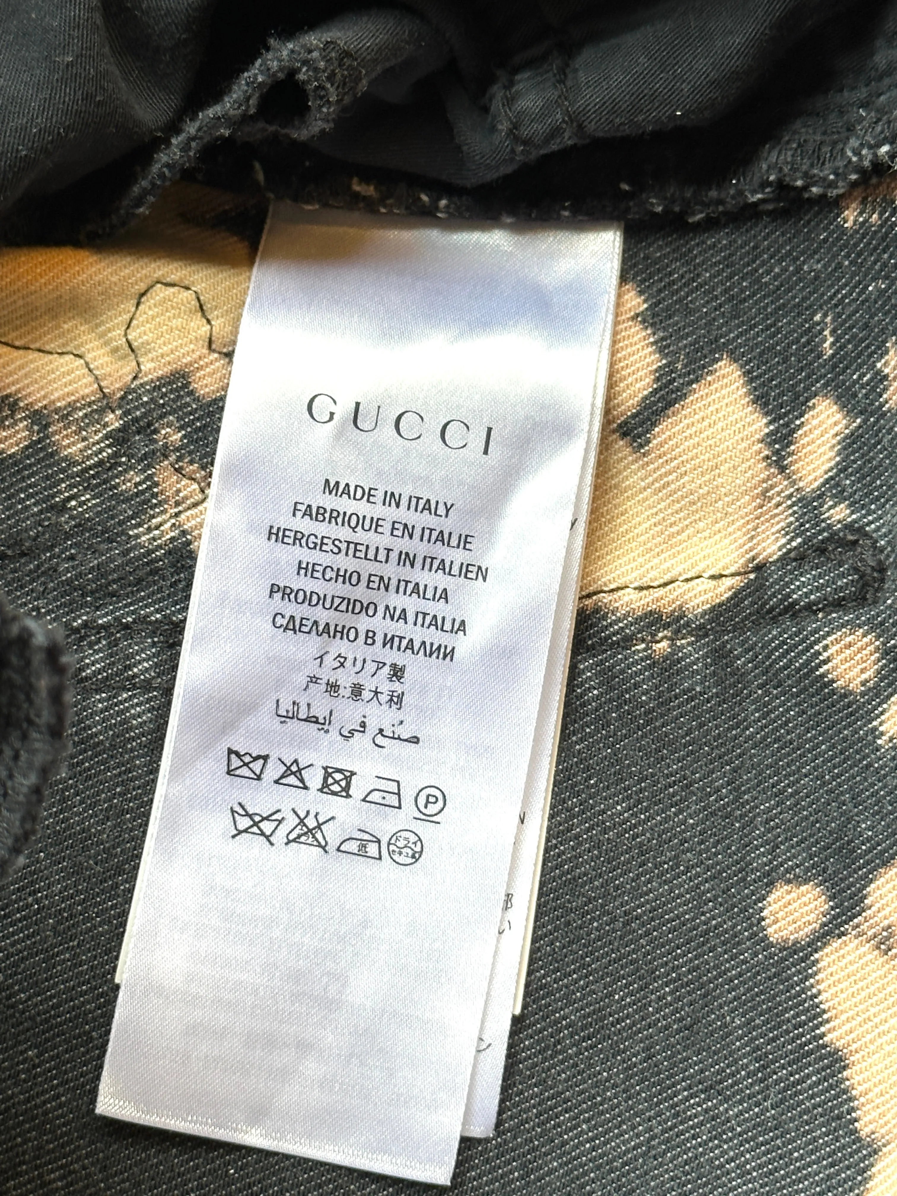 GUCCI Bleach Splattered Skinny Jeans with Rose Patch • Small