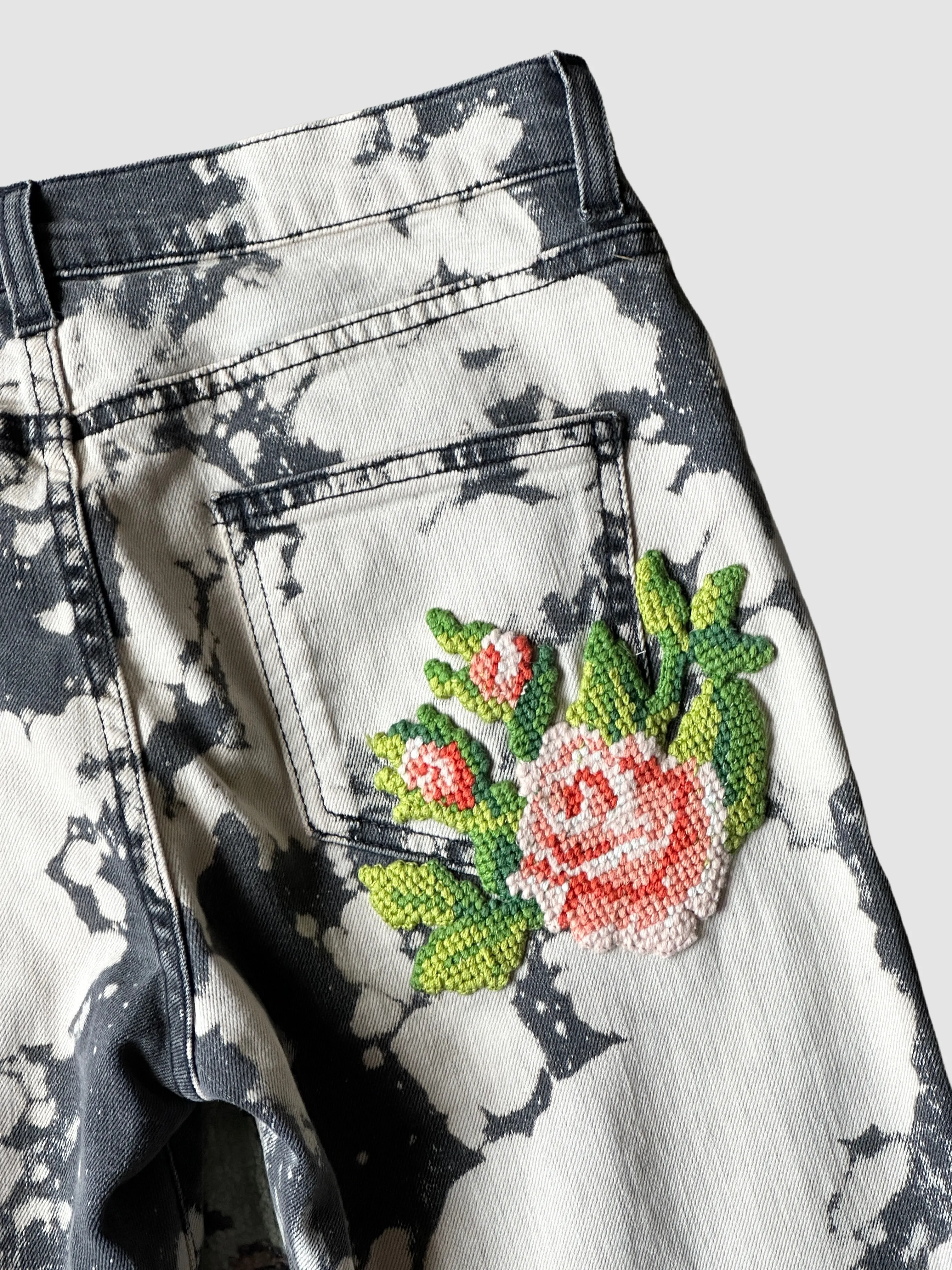 GUCCI Bleach Splattered Skinny Jeans with Rose Patch • Small